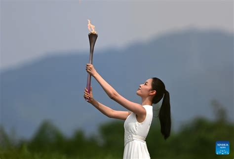 Flame For Hangzhou Asian Games Lit In Liangzhu Culture Site