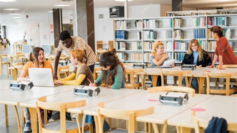 premium photo group  students studying   university library