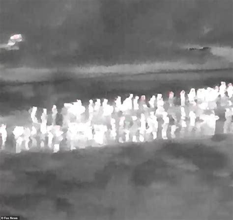 Shocking Night Vision Footage Shows Moment More Than 500 Migrants Sneak