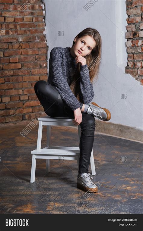 Confident Girl Sitting Image & Photo (Free Trial) | Bigstock