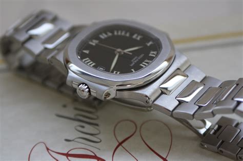 Patek Philippe Nautilus Steel Ref With Black Roman Dial