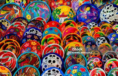 Bright Multicolored Plates Display At A Street Market Stall In Chichen