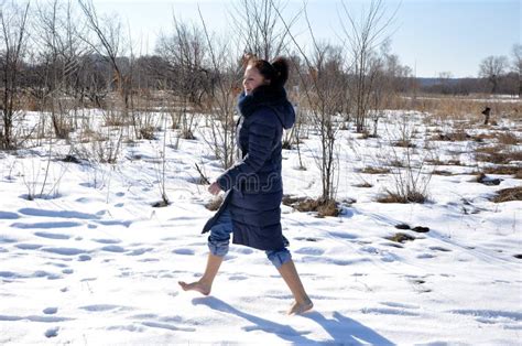 Pretty Girl Barefoot Walking on Snow Stock Image - Image of face, young: 80547163