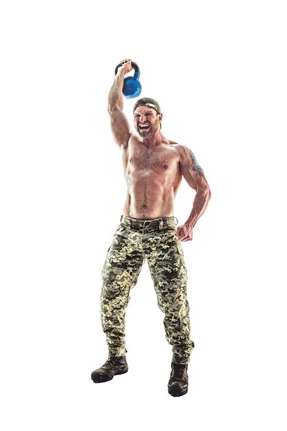 Premium Photo Muscular Athlete Bodybuilder Man In Camouflage Pants