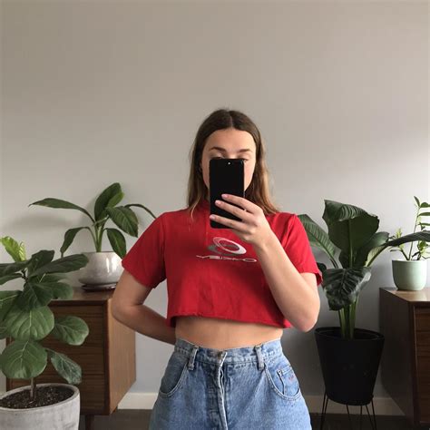 Red Oakley Crop Y2k Print On The Front And Has Raw Depop