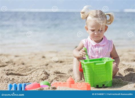 Little Girl Playing Sand Toys At The Beach Stock Image Image Of Cute