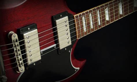 10 Famous Gibson Sg Players And Their Guitars Spinditty