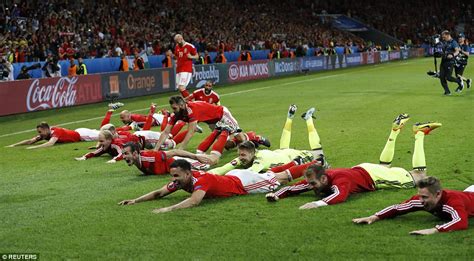 Wales Team Celebrate Historic Euro 2016 Victory Over Belgium By Leading