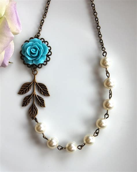 A Something Blue Rose Flower With Ivory Pearls Necklace