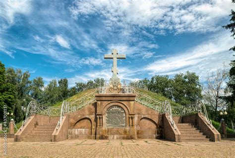 Poltava, Ukraine - May 24 2021: Stone cross and bronze coat of arms of ...