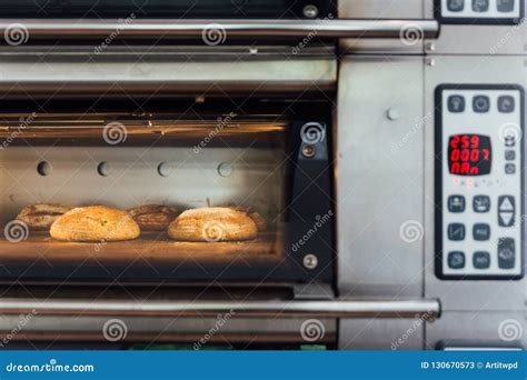 Homemade Bread Baking In Electric Oven Production Oven At The Bakery