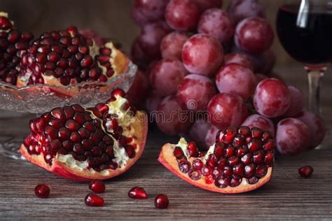 Juicy Pomegranate With Red Grape And Red Wine Still Life With