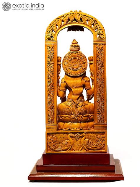 Goddess Lakshmi Seated On Kirtimukha Throne Sandalwood Carved