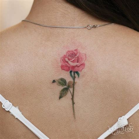 Pink Rose Tattoo On The Upper Back Pink Rose Tattoos Dainty Tattoos