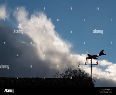 Storm passes to reveals a bright blue sky Stock Photo - Alamy