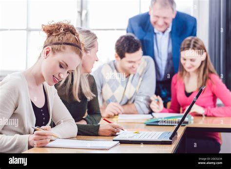 College Students Having Teamwork Learning Together Stock Photo Alamy