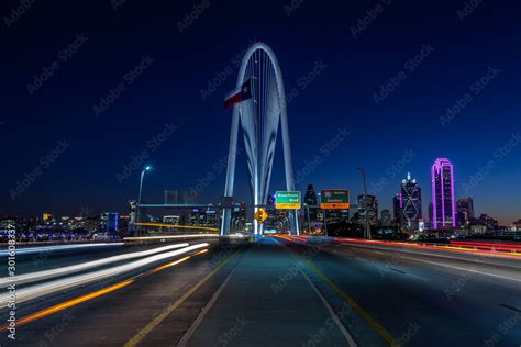 Dallas skyline w/traffic at night Stock Photo | Adobe Stock