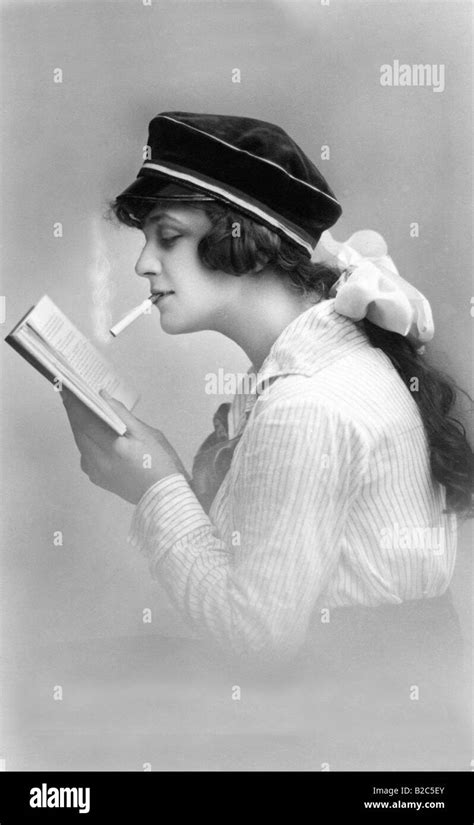 Modern youth, woman smoking cigarette and reading, historic picture ...