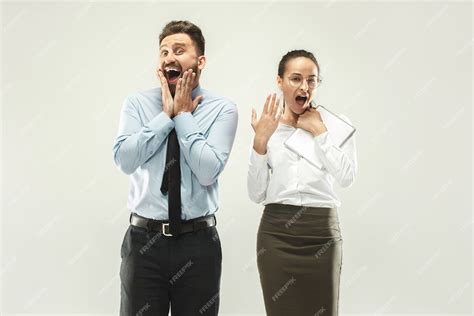 Free Photo Happy Boss Man And His Secretary Standing At Office Or