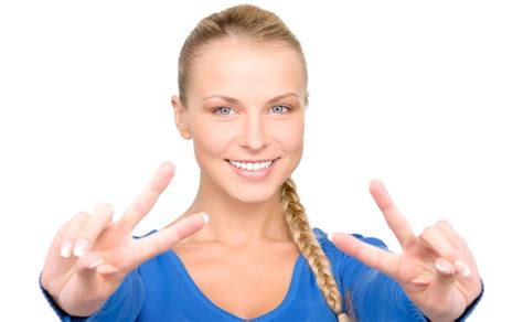 Premium Photo Bright Portrait Of Lovely Blonde Showing Victory Sign