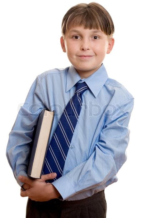 School Boy Student In Uniform With A Book Or Textbook Under Arm Stock