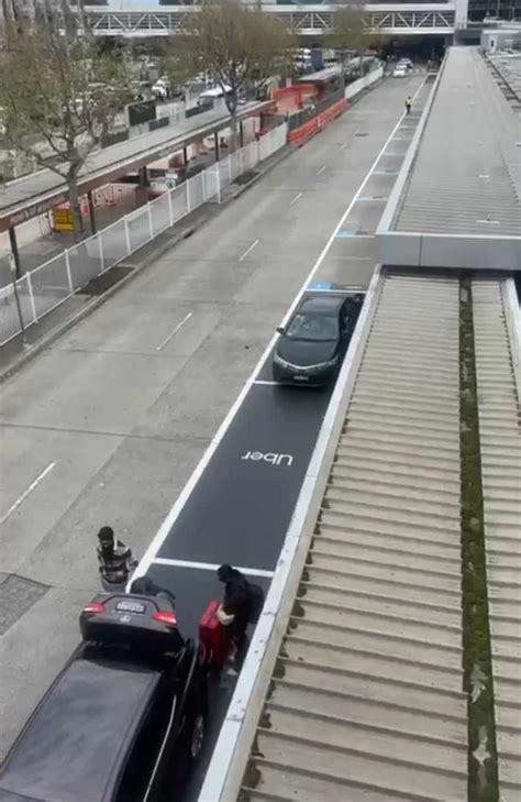 Footy fans waiting three hours for Ubers at airport amid driver strike ...