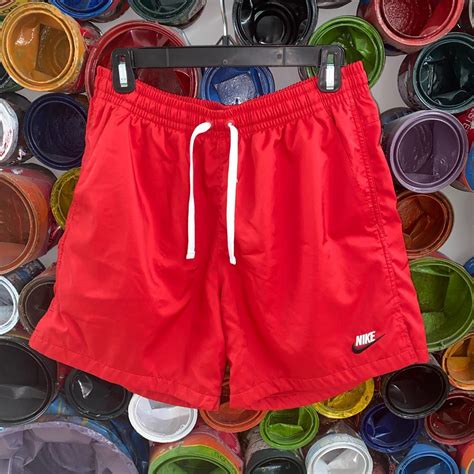 red nike shorts - Depop