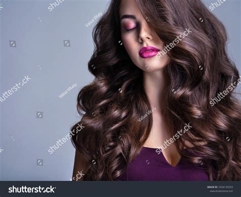 fashion model wavy hairstyle attractive young stock photo