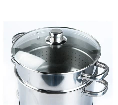 Stainless steel cooking pots — Stock Photo © gilmanshin #1182409