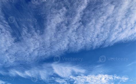 Stunning cirrus cloud formation panorama in a deep blue sky 12056206 Stock Photo at Vecteezy