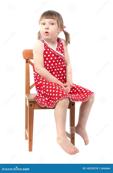 Amazed Child Sitting On A Chair Royalty Free Stock Photos - Image: 14223218