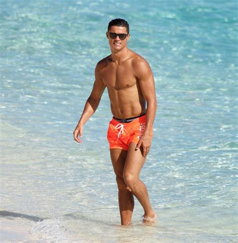 Cristiano Ronaldo Flaunts Insanely Buff Bod With Son On Beach