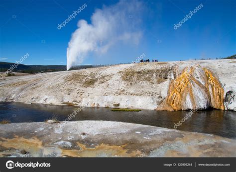 Old Faithful geyser eruption — Stock Photo © swisshippo #133993244