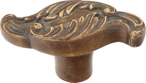 Cantata Collection Solid Brass Oblong Knob With Wave Designs In Monticello Brass By Schaub And