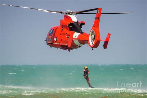 Rescue Diver US Coast Guard H 65 Helicopter Photograph By Rene Triay