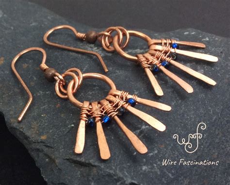 Handmade Copper Earrings Wire Wrapped Spokes With Dark Blue Glass