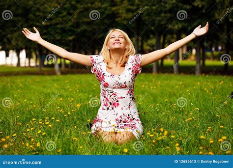 Woman Sitting In The Grass And Enjoy The Sun Stock Image Image Of