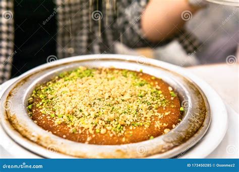 famous turkish desserts kunefe  cheese walnut  pistachios stock