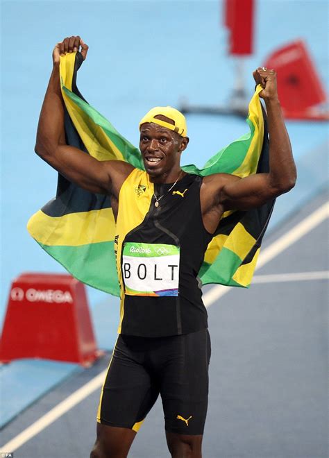 Bolt Wrapped Himself In The Jamaican Flag As He Took His Victory Lap