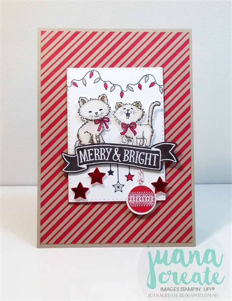 A Card With Two Cats On It And Merry And Bright Written Across The