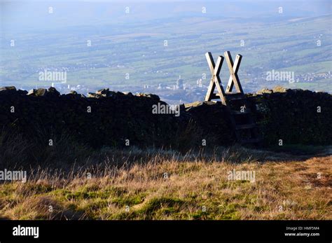 Wooden Ladder Stile Over Dry Stone Wall On Pendle Hill Above Clitheroe