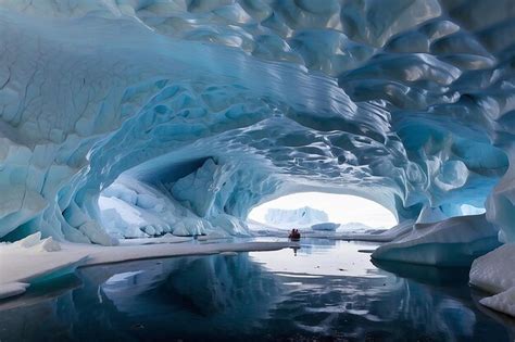 Premium Photo | Antarctic ice caves shimmering blue