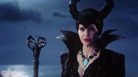 The Maleficent Character Is Dressed In Black With Horns