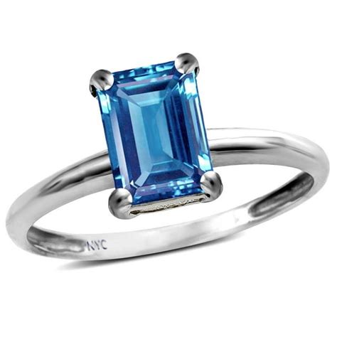 Star K Classic Octagon Emerald Cut 8x6mm Genuine Blue Topaz Solitaire