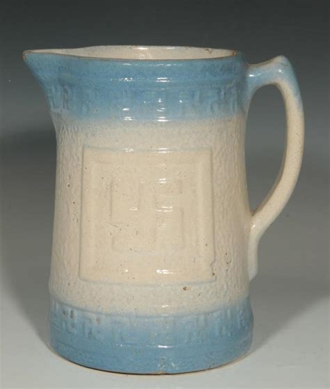 An Antique Blue And White Stoneware Pitcher