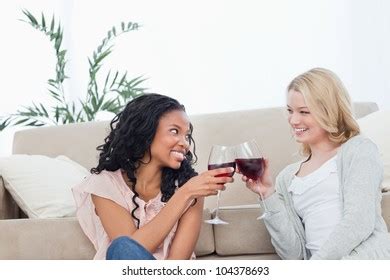 Same Sex Mature Female Couple Celebrating Stock Photo