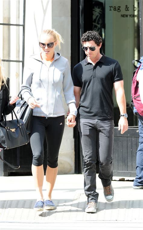 Caroline Wozniacki With Rory McIlroy in London - May 2014 • CelebMafia