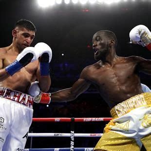 Boxe Crawford Surclasse Khan Et Conserve Son Titre WBO Eurosport