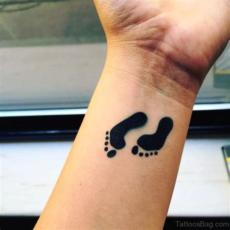 Adorable Baby Footprint Tattoos On Wrist