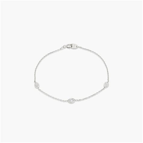 6.5" Knife-Edge Bezel Station Bracelet in White Gold | Marquise Cut